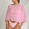 Zarayah genomskinlig poncho i Candyfloss Pink Zarayah genomskinlig poncho i Candyfloss Pink