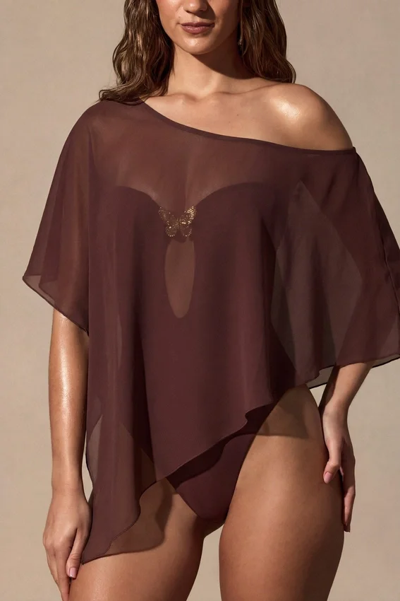 Zarayah genomskinlig poncho i espressobrun Zarayah genomskinlig poncho i espressobrun
