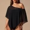 Zarayah Sheer Poncho i svart Zarayah Sheer Poncho i svart
