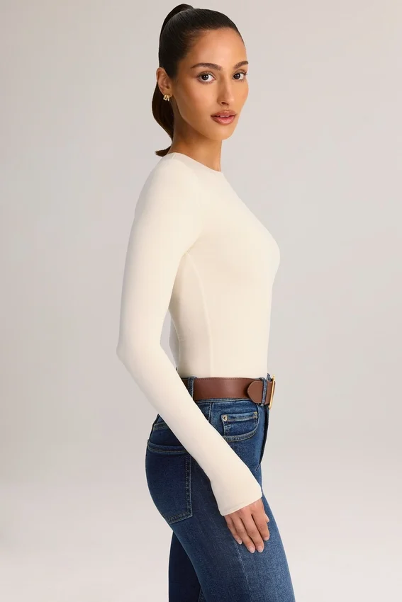 Ziva Modal rundhalsad långärmad Bodys i krämfärg Ziva Modal rundhalsad långärmad Bodys i krämfärg